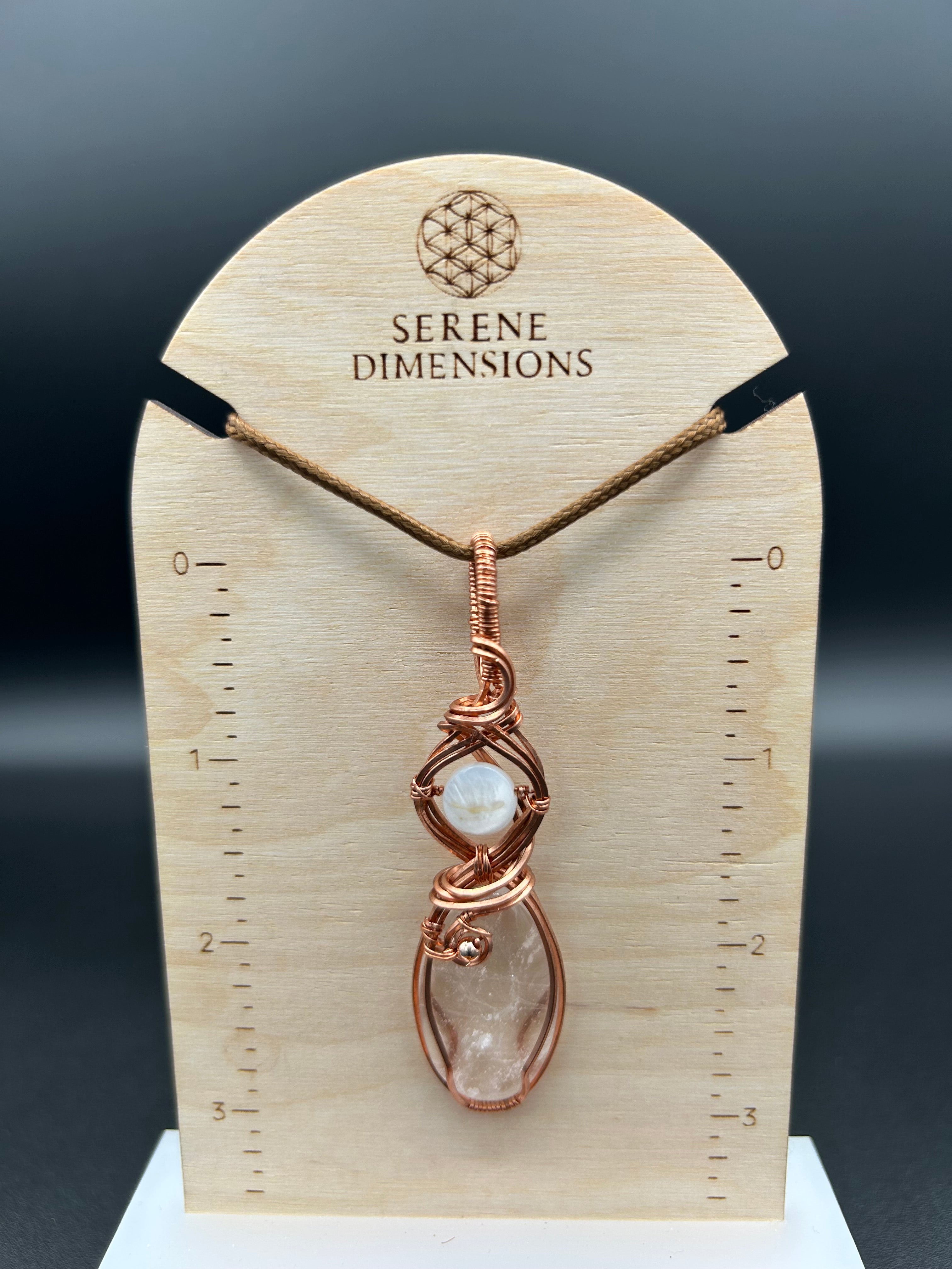 Clear Quartz and Mother of Pearl in Copper